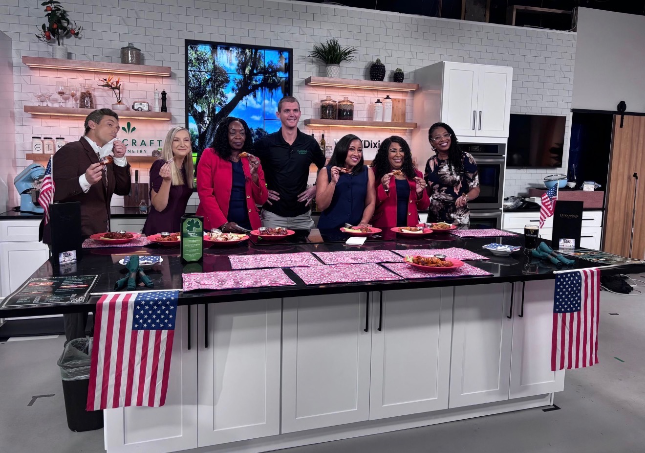 Alliance members appearing on a local television segment